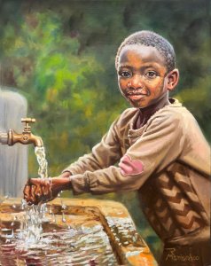 young boy washing hands